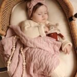Bamboo baby blanket knitted with cable pattern | Pink