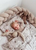 Serpent de lit bouclé beige